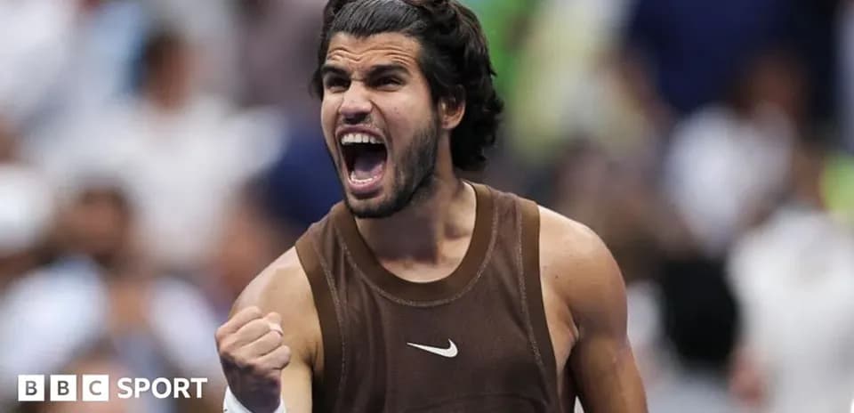 Tennis player celebrating victory with a clenched fist