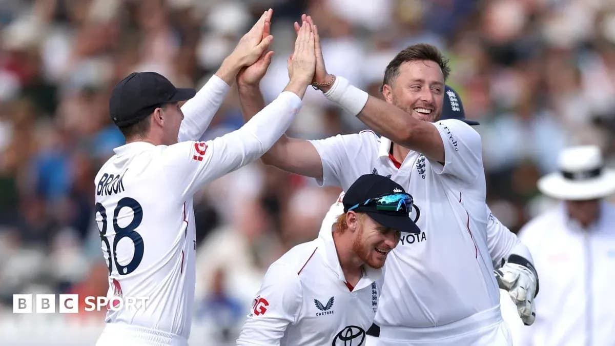 England cricket players celebrating a wicket together