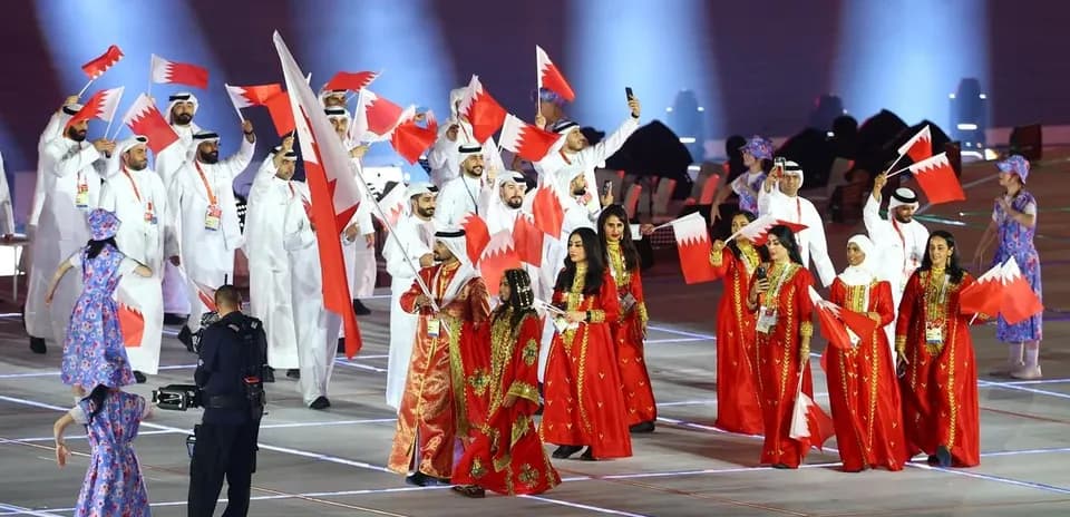 Bahrain team parading with flags at event