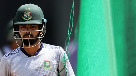 Cricketer wearing helmet in training area