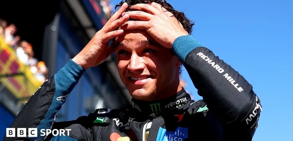 Driver celebrating after race, touching his head