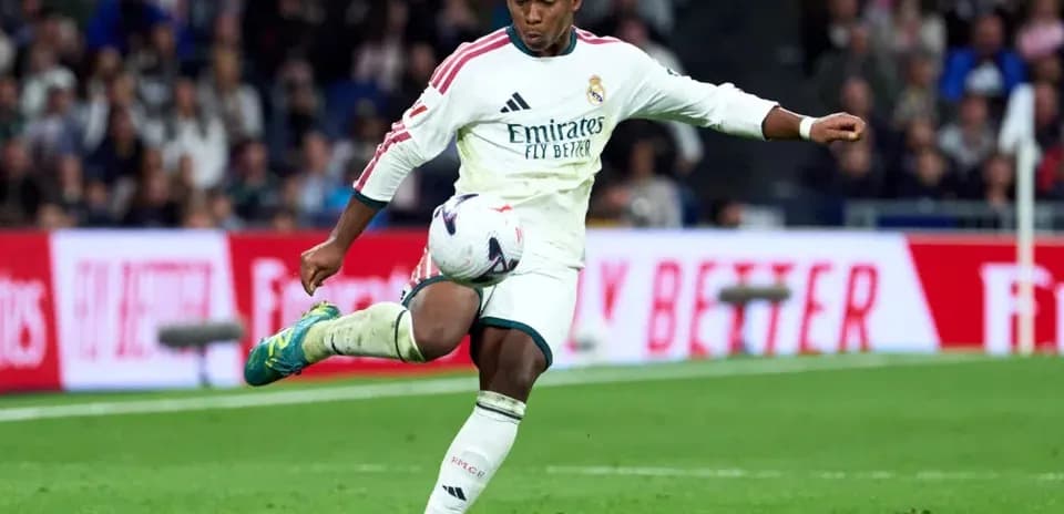 Player kicking the ball during a match