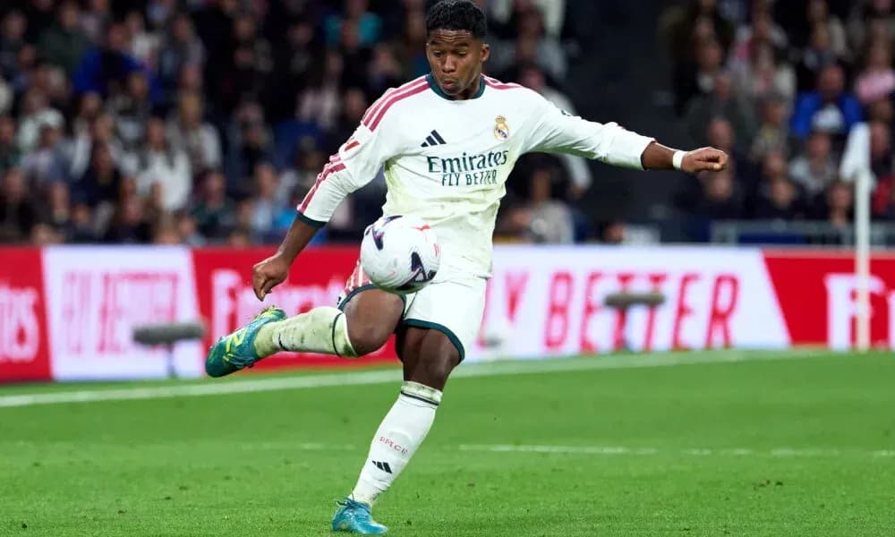 Player kicking the ball during a match