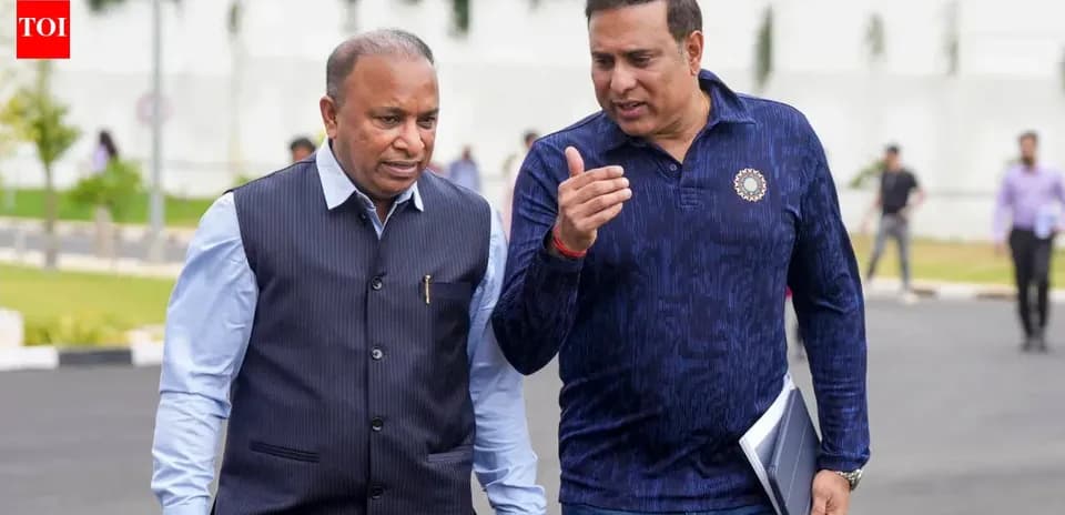 Two men walking and discussing outdoors