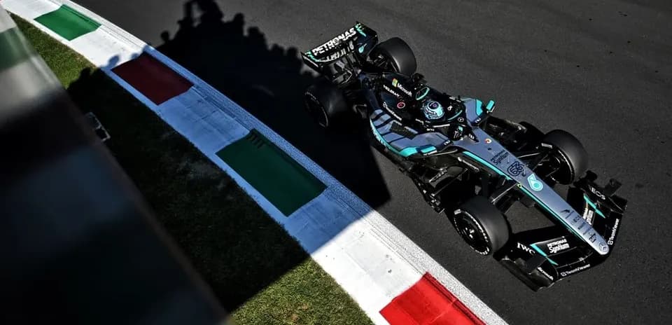 Formula 1 car navigating a corner on track
