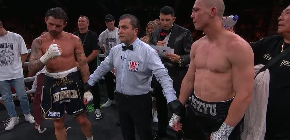 Boxers standing in the ring after match decision