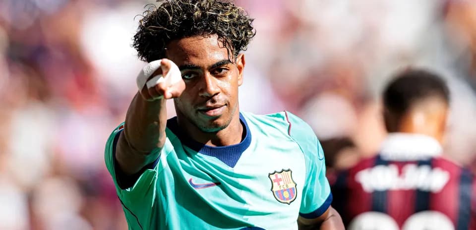 Player celebrating and pointing after scoring goal