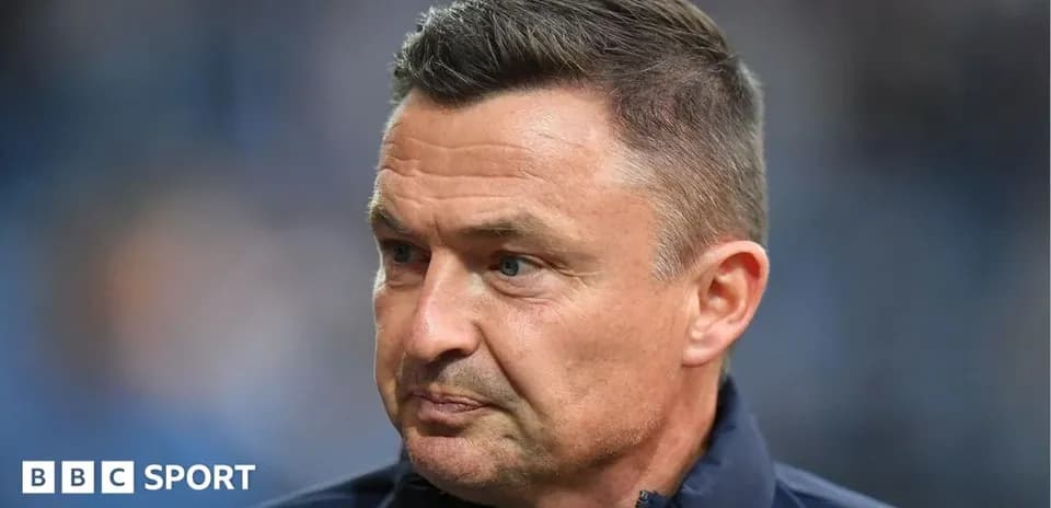 Coach during press conference or match interview
