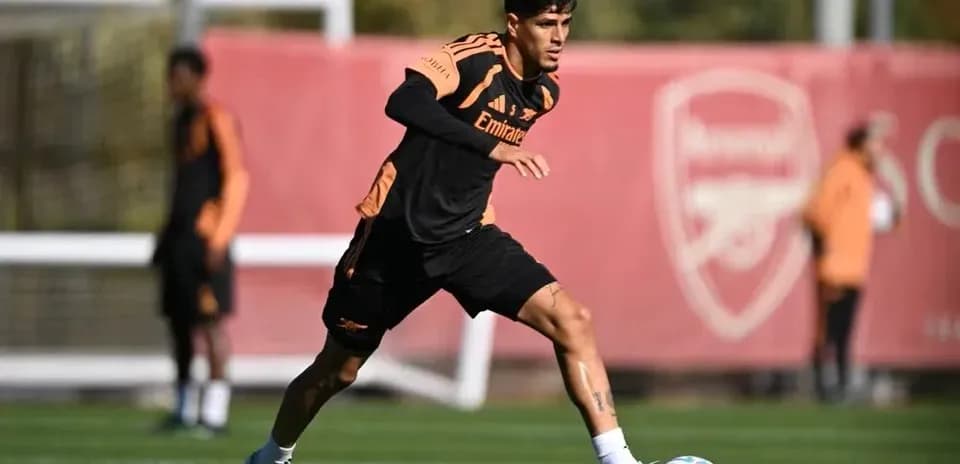 Player dribbling ball during Arsenal training session