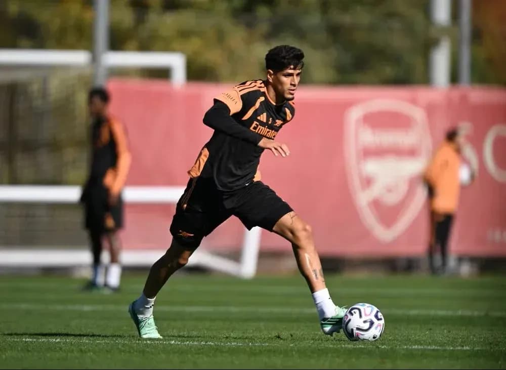 Player dribbling ball during Arsenal training session