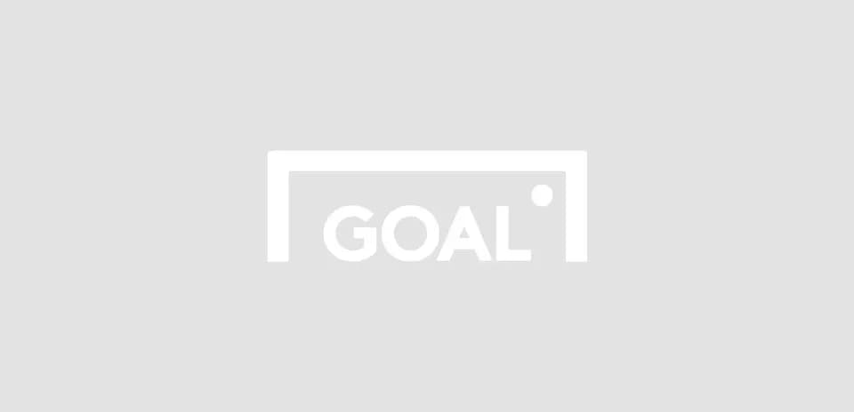 Empty soccer goal with 'GOAL' sign displayed
