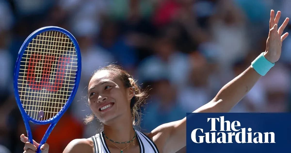 Tennis player celebrating with racket raised in victory