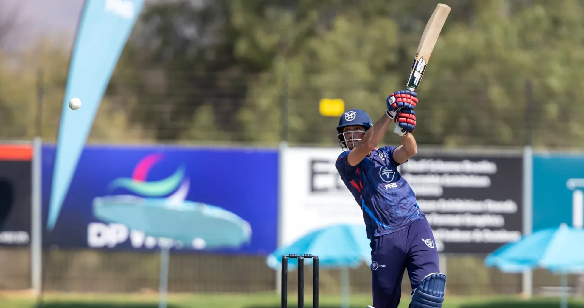 Batsman hitting a cricket ball during practice