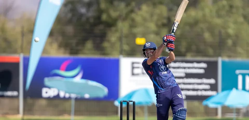 Batsman hitting a cricket ball during practice