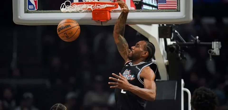 Player dunking the basketball during a game