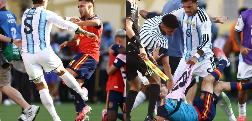 Players clashing during intense football match action