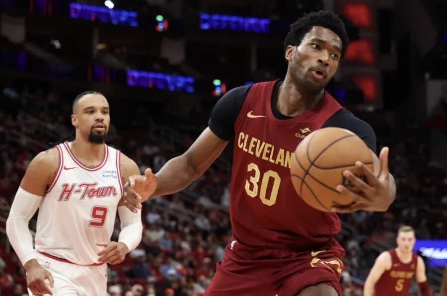 Player dribbling basketball during game action
