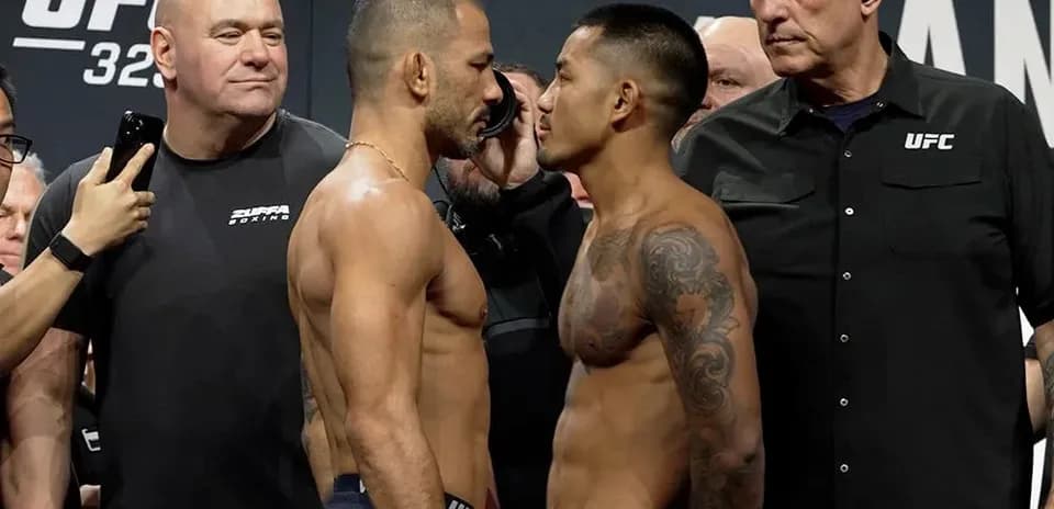 Fighters face-off during UFC weigh-in event