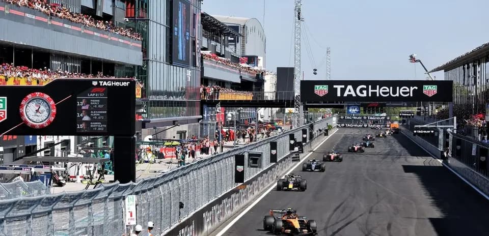 Formula 1 cars racing at the track during event