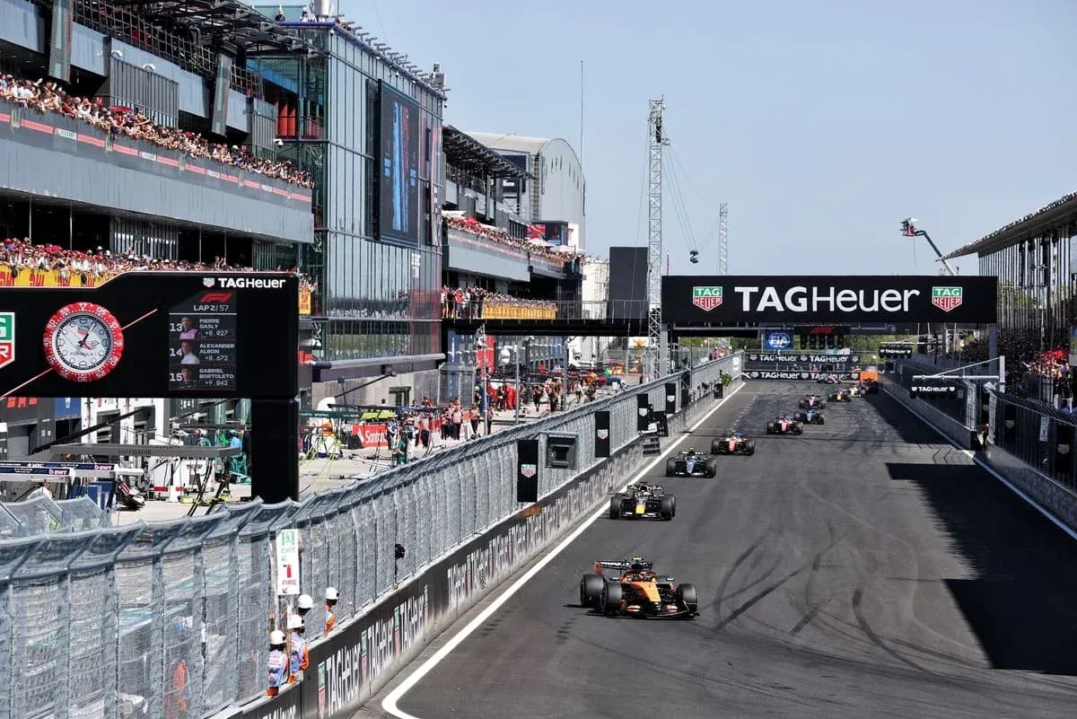 Formula 1 cars racing at the track during event