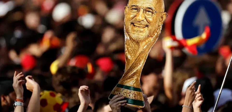 Fans celebrating with FIFA World Cup trophy outdoors