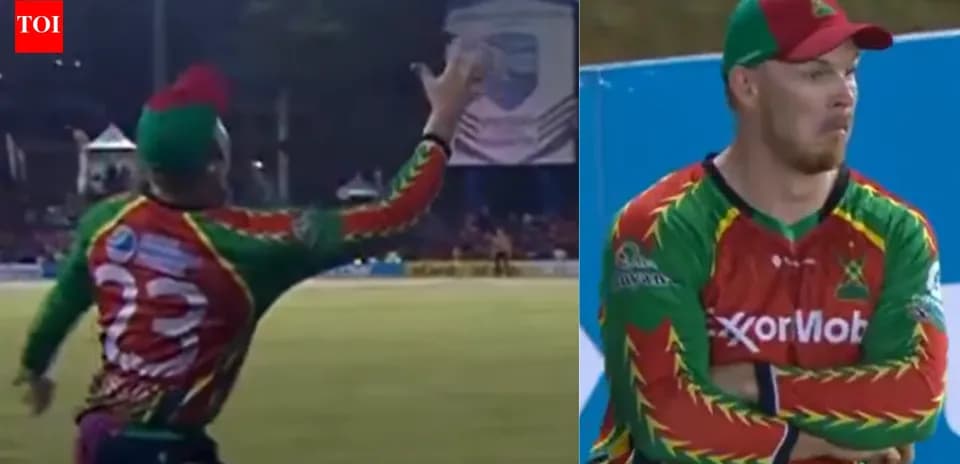 Player fielding during cricket match in colorful jersey