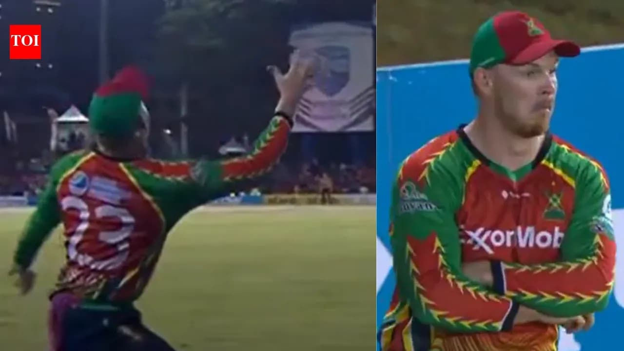 Player fielding during cricket match in colorful jersey