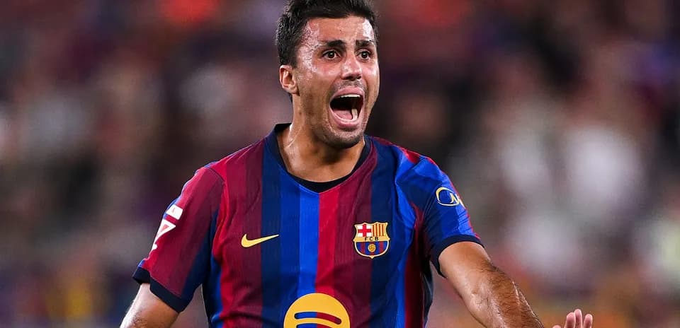 Player in Barcelona kit shouting during match