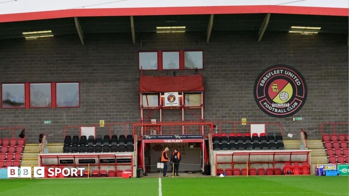 Ebbsfleet United stadium entrance with staff members