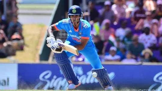 Batsman playing a shot during cricket match