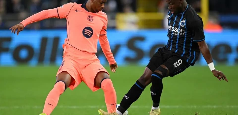 Two players battling for the ball during match
