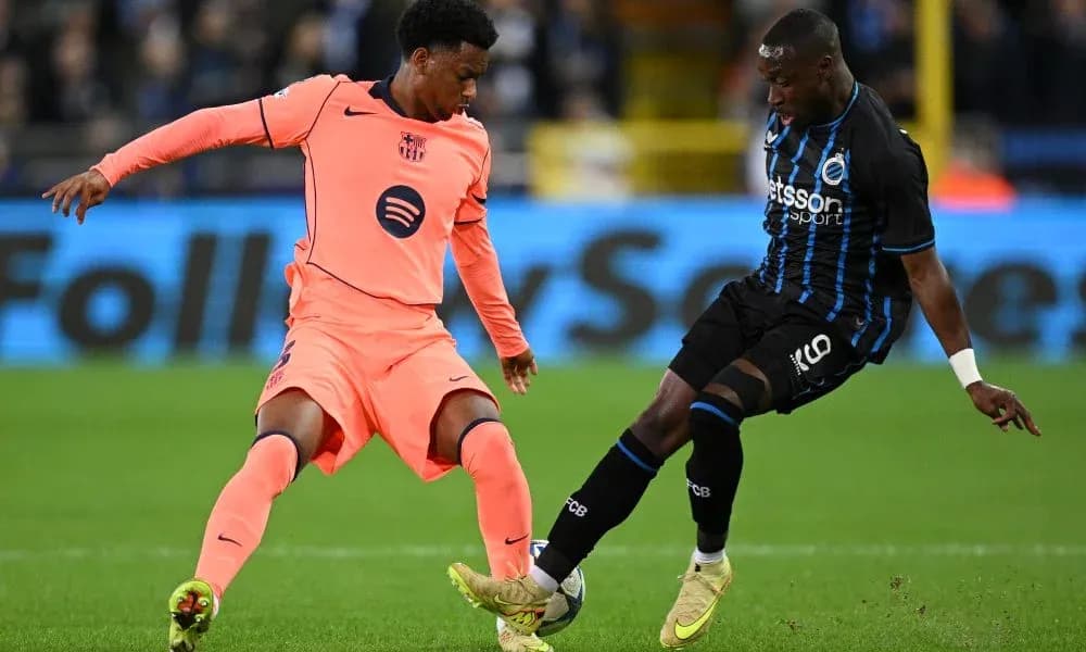 Two players battling for the ball during match