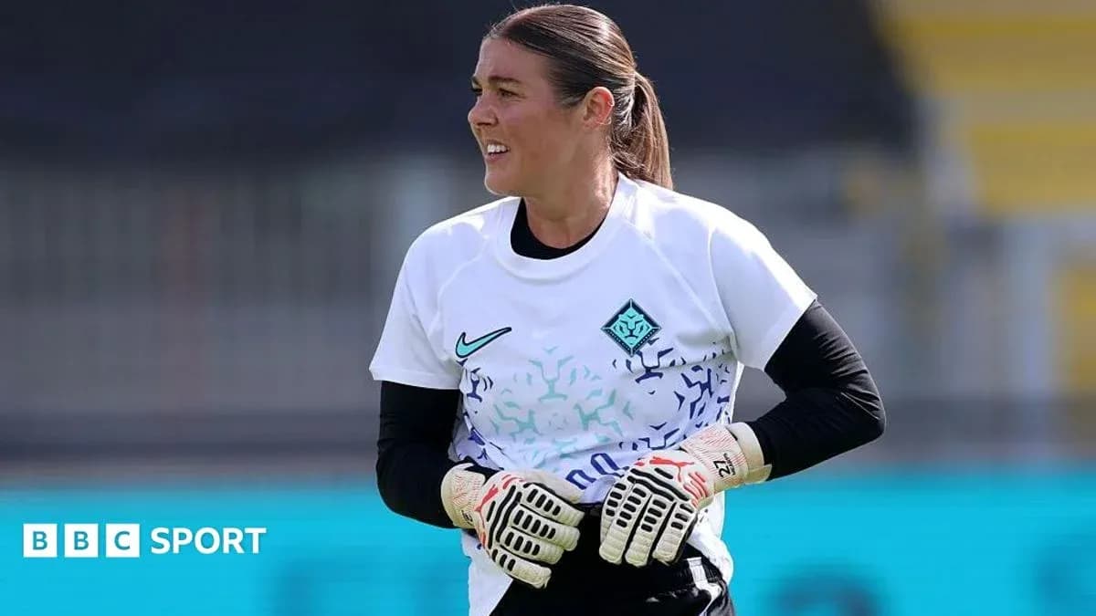 Goalkeeper in training gear preparing for session