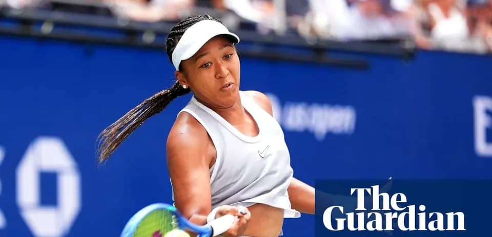Naomi Osaka hitting a tennis ball during match