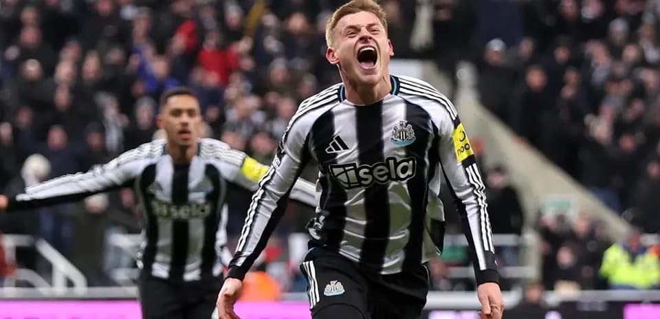 Newcastle player celebrating goal in match