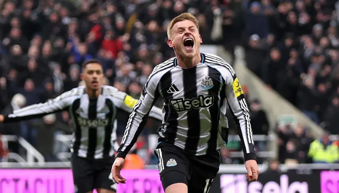Newcastle player celebrating goal in match
