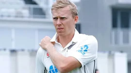 Cricketer adjusting his shoulder during practice