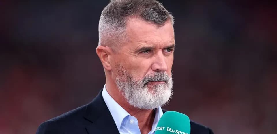Sport analyst speaking into microphone on set