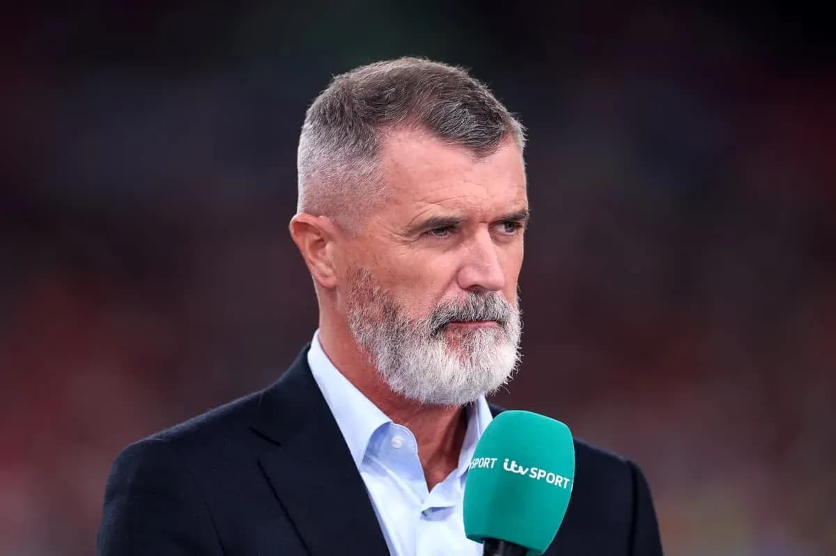 Sport analyst speaking into microphone on set