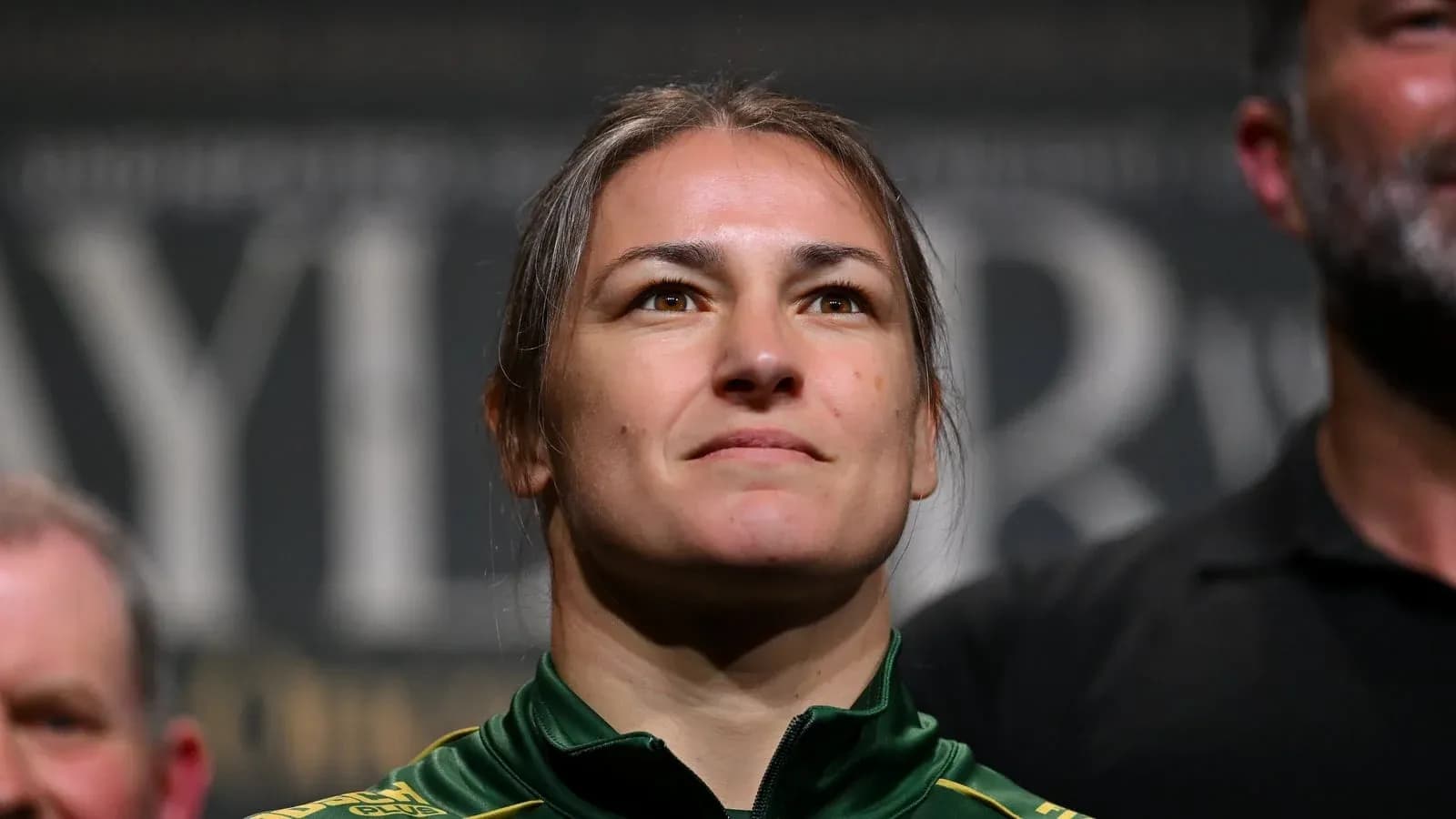 Athlete at weigh-in event with focused expression