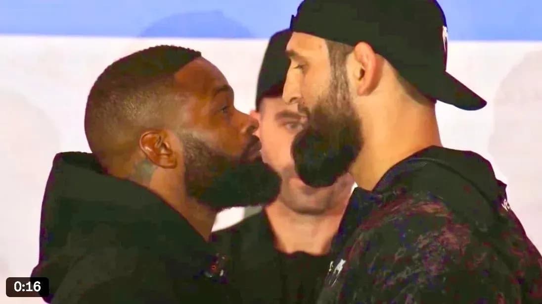 Two fighters facing off at weigh-in event