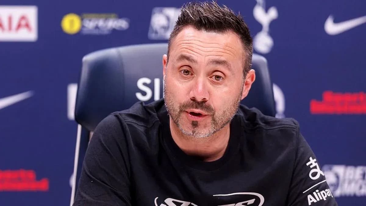 Manager speaking at press conference podium