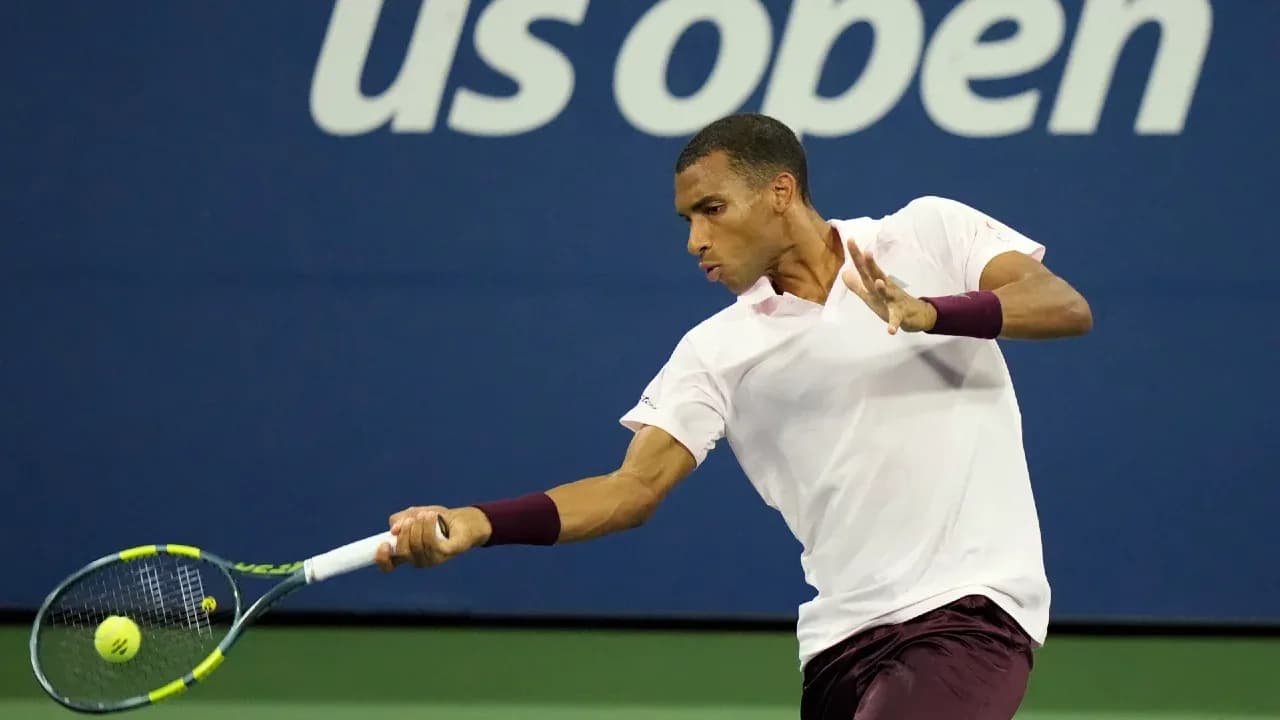 Player hitting a backhand shot at US Open