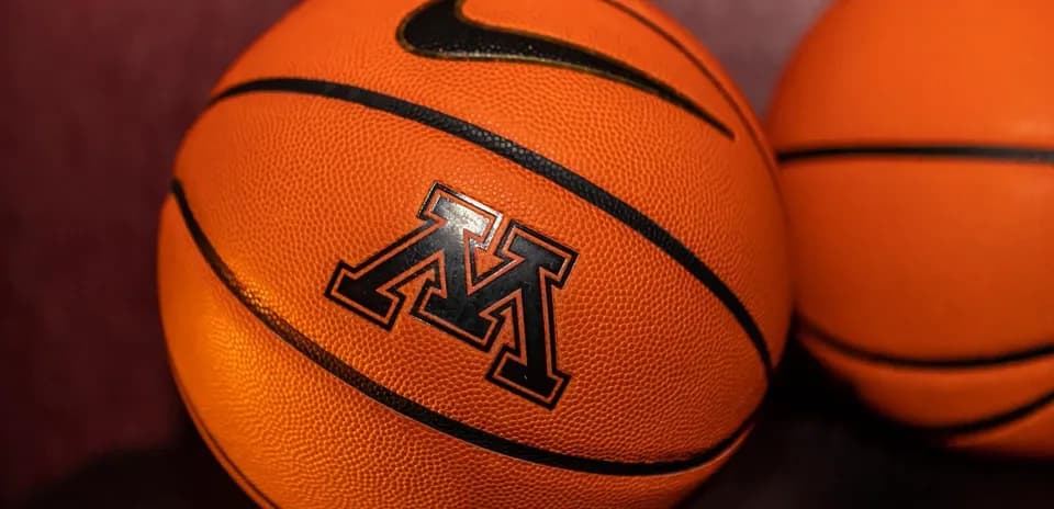 Two basketballs featuring the Minnesota logo