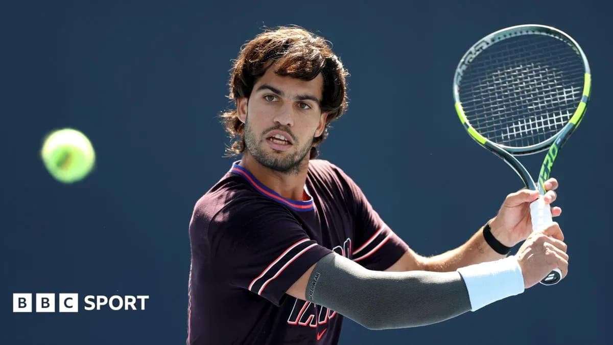 Tennis player preparing to hit a forehand shot