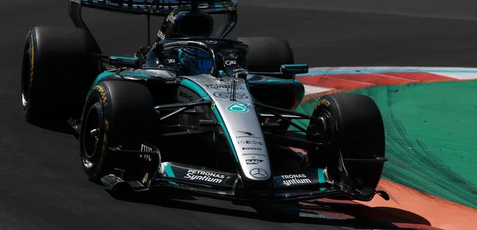 Mercedes Formula 1 car navigating a corner on track