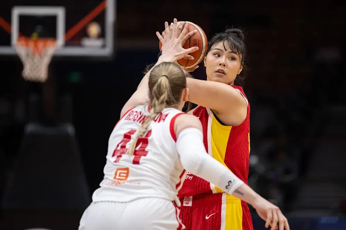 Player passing the ball during a basketball game