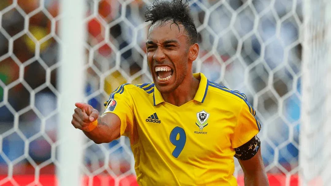 Player celebrating a goal in yellow jersey