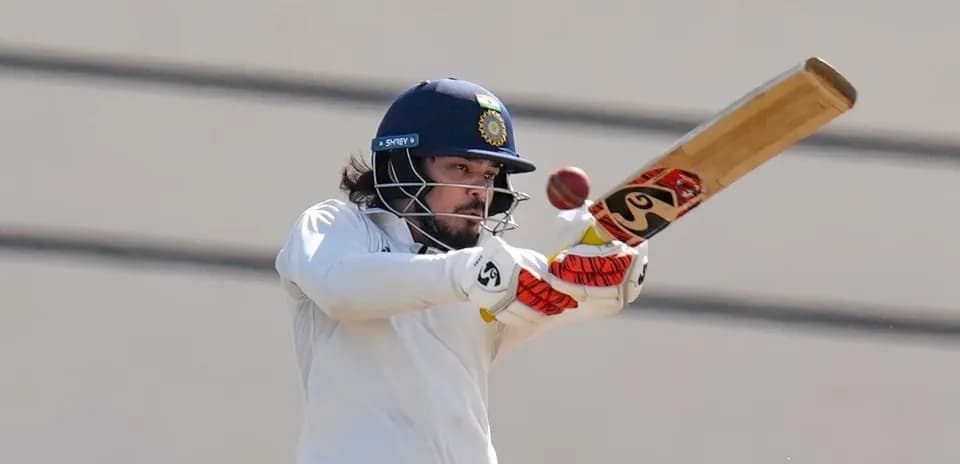 Batsman playing a shot during cricket match