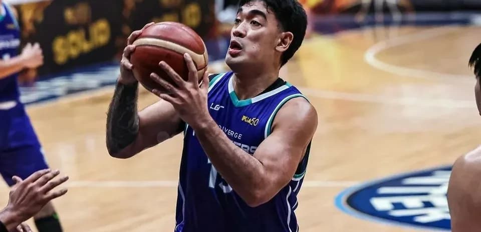 Player shooting basketball during a game
